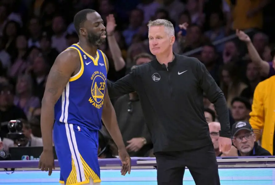 May 12, 2023; Los Angeles, California, USA; Golden State Warriors forward Draymond Green (23) walks past head coach Steve Kerr after fouling out in the second half of game six of the 2023 NBA playoffs at Crypto.com Arena. Mandatory Credit: Jayne Kamin-Oncea-USA TODAY Sports NBA news