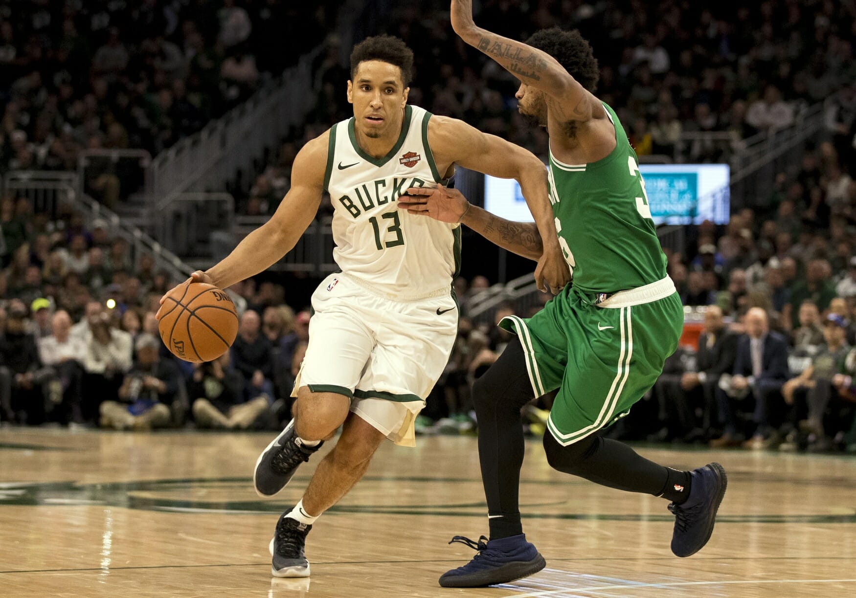 May 8, 2019; Milwaukee, WI, USA; Milwaukee Bucks guard Malcolm Brogdon (13) drives for the basket against Boston Celtics guard Marcus Smart (36) during the fourth quarter in game five of the second round of the 2019 NBA Playoffs at Fiserv Forum. Mandatory Credit: Jeff Hanisch-USA TODAY Sports (NBA Rumors)