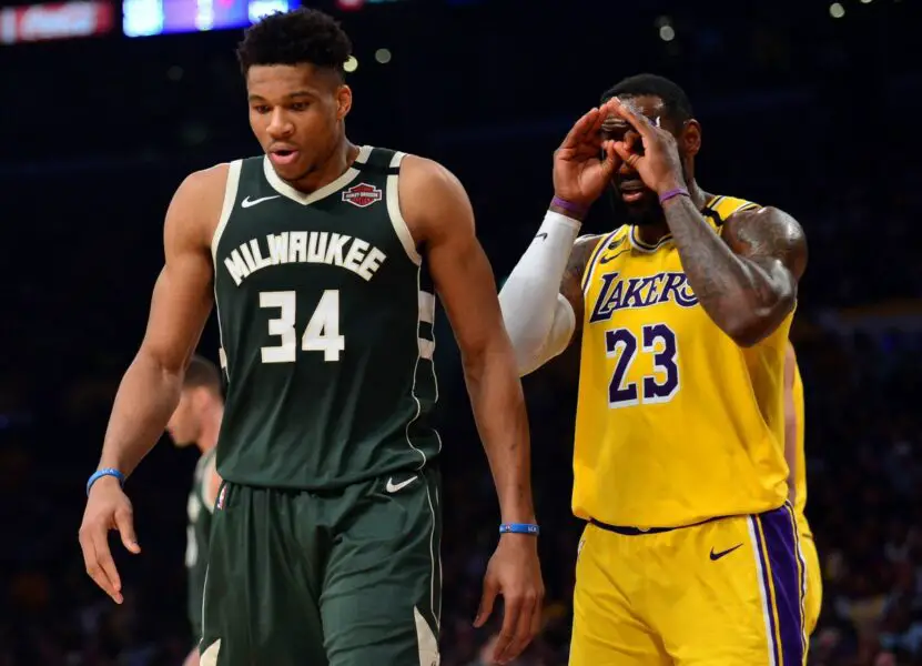 March 6, 2020; Los Angeles, California, USA; Los Angeles Lakers forward LeBron James (23) reacts toward Milwaukee Bucks forward Giannis Antetokounmpo (34) during the second half at Staples Center. Mandatory Credit: Gary A. Vasquez-USA TODAY Sports (NBA News)