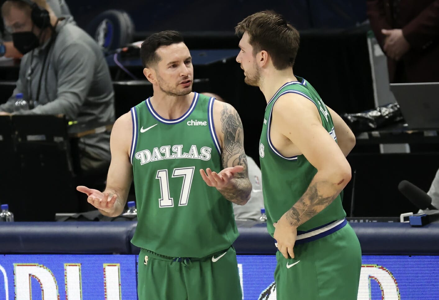Apr 16, 2021; Dallas, Texas, USA; Dallas Mavericks guard JJ Redick (17) speaks with guard Luka Doncic (77) during the second quarter against the New York Knicks at American Airlines Center. Mandatory Credit: Kevin Jairaj-USA TODAY Sports (NBA Rumors)