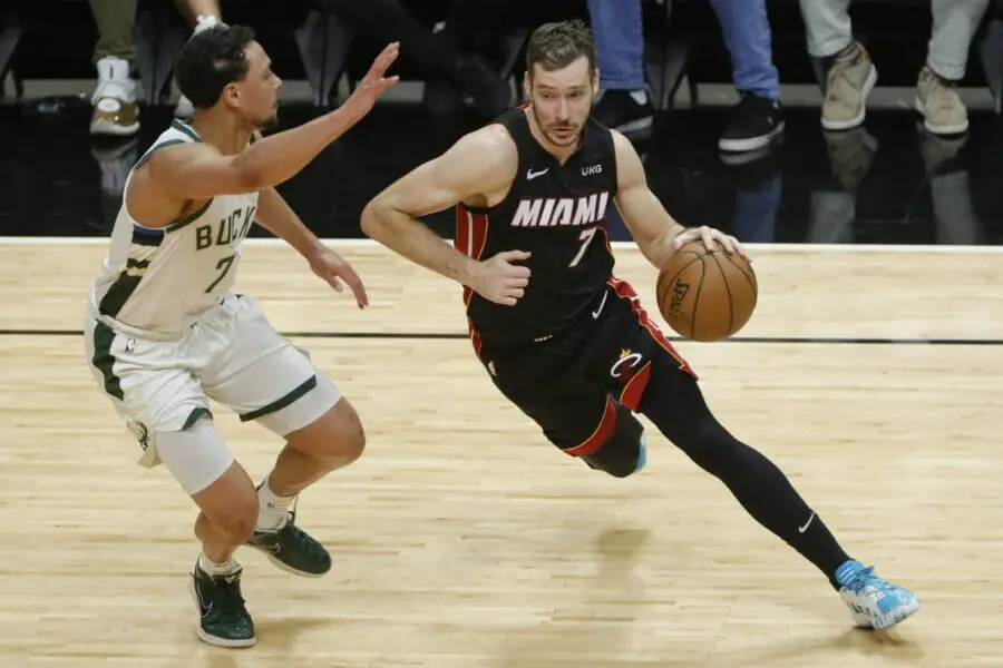May 29, 2021; Miami, Florida, USA; Miami Heat guard Goran Dragic (right) dribbles the basketball against Milwaukee Bucks guard Bryn Forbes (left) during the second quarter of game four in the first round of the 2021 NBA Playoffs at American Airlines Arena. Mandatory Credit: Sam Navarro-USA TODAY Sports (NBA Rumors)