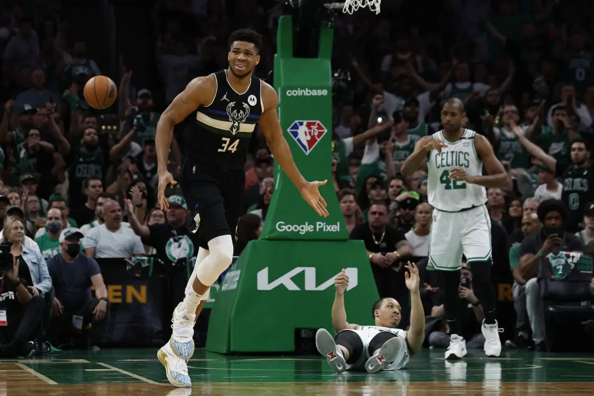 May 15, 2022; Boston, Massachusetts, USA; Milwaukee Bucks forward Giannis Antetokounmpo (34) gestures at Boston Celtics forward Grant Williams (12) who fell to the ground as Antetokounmpo made a basket during the first quarter of game seven of the second round of the 2022 NBA playoffs at TD Garden. Mandatory Credit: Winslow Townson-USA TODAY Sports (NBA RUmors)