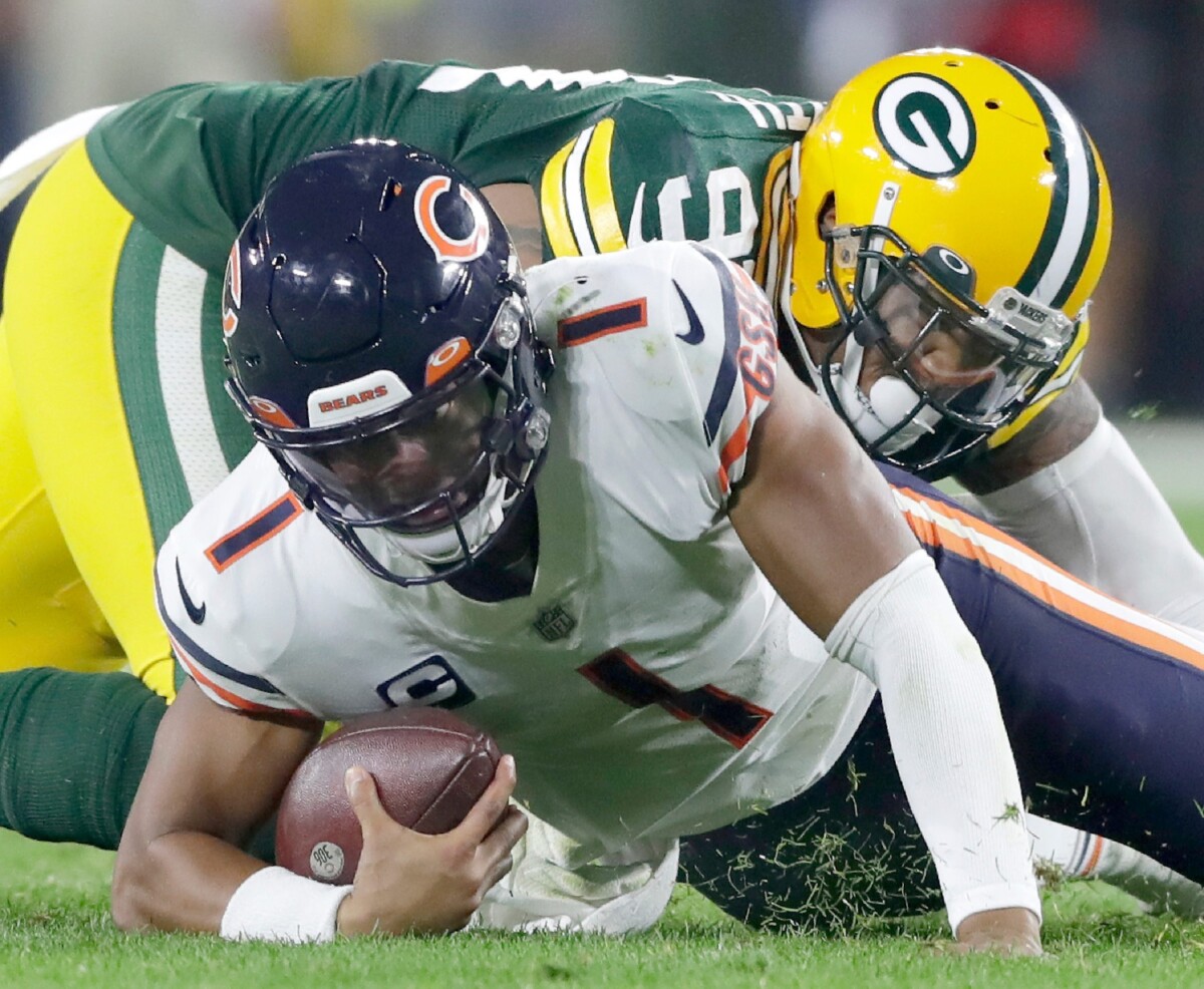 Green Bay Packers linebacker Preston Smith (91) sacks Chicago Bears quarterback Justin Fields (1) during their football game on Sunday, September 18, 2022 at Lambeau Field. in Green Bay, Wis. Wm. Glasheen USA TODAY NETWORK-Wisconsin (NFL News) Apc Pack Vs Bears 4284 091822wag