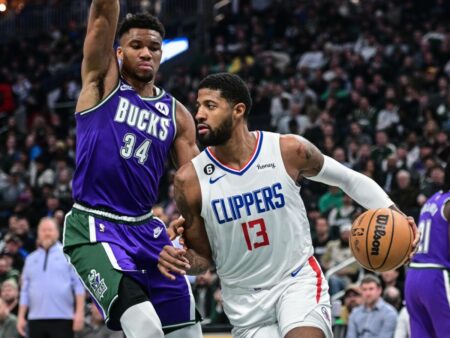 Feb 2, 2023; Milwaukee, Wisconsin, USA; Los Angeles Clippers forward Paul George (13) drives past Milwaukee Bucks forward Giannis Antetokounmpo (34) in the first quarter at Fiserv Forum. Mandatory Credit: Benny Sieu-USA TODAY Sports (NBA News)