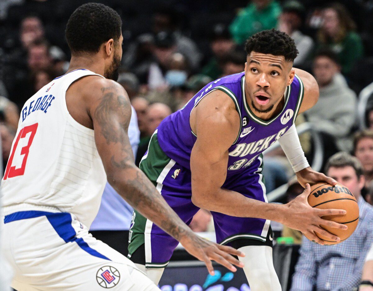 Feb 2, 2023; Milwaukee, Wisconsin, USA; Milwaukee Bucks forward Giannis Antetokounmpo (34) looks to get around Los Angeles Clippers forward Paul George (13) in the third quarter at Fiserv Forum. Mandatory Credit: Benny Sieu-USA TODAY Sports (NBA Rumors, NBA News)