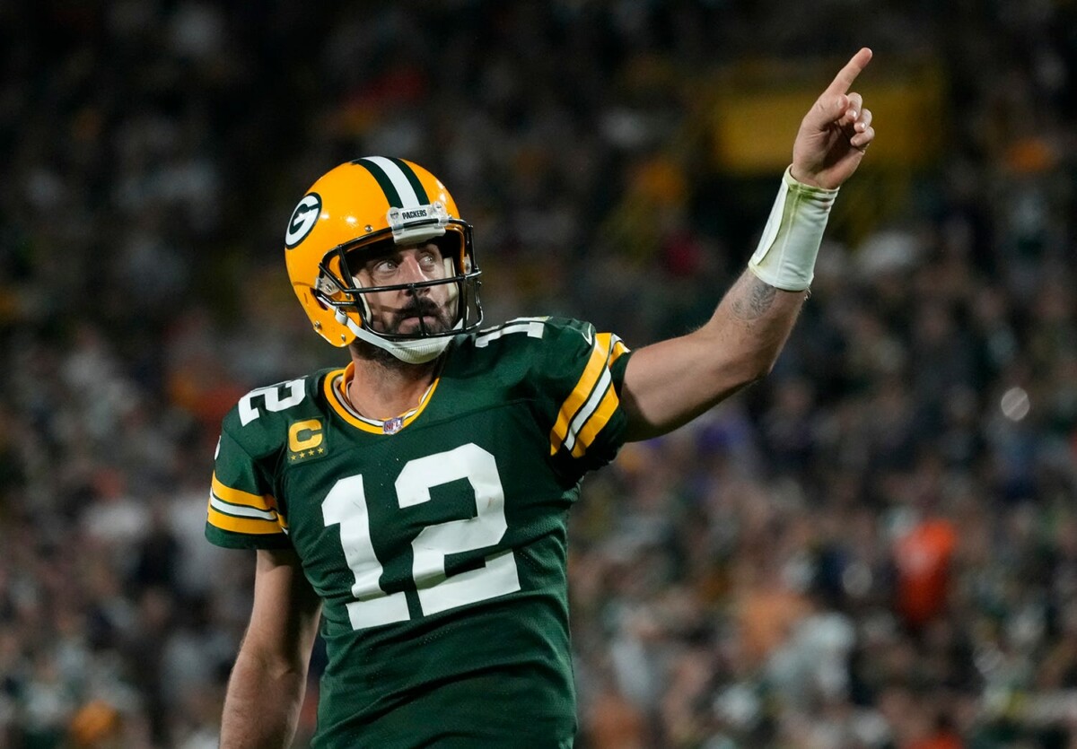 Green Bay Packers quarterback Aaron Rodgers (12) celebrates after rushing for a first down during the fourth quarter of their game against the Chicago Bears on Sunday, Sept. 18, 2022 at Lambeau Field in Green Bay.Mjs Packers Bears Packers19 3137 114468354 (NFL News)