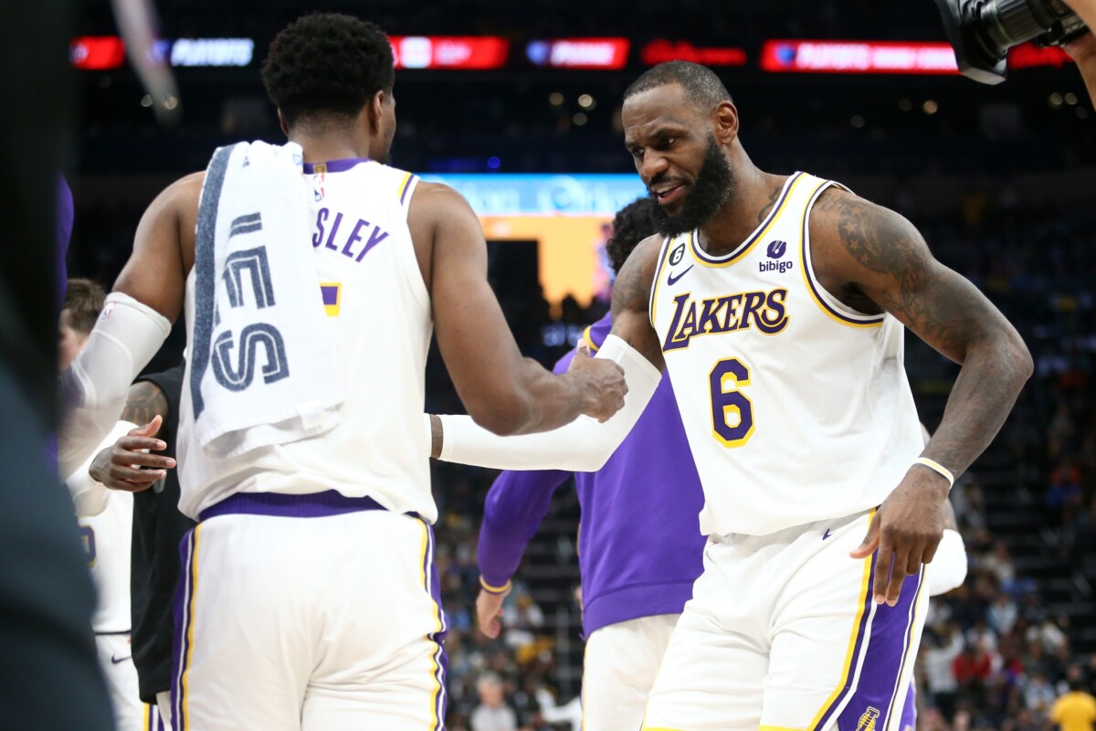 Apr 16, 2023; Memphis, Tennessee, USA; Los Angeles Lakers forward LeBron James (6) reacts with guard Malik Beasley (5) during the second half during game one of the 2023 NBA playoffs against the Memphis Grizzlies at FedExForum. Mandatory Credit: Petre Thomas-USA TODAY Sports (NBA NewS - Bucks)