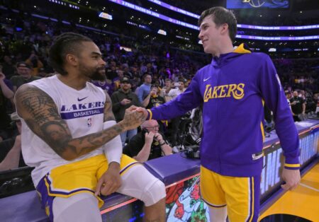 May 12, 2023; Los Angeles, California, USA; Los Angeles Lakers guard D'Angelo Russell (1) and guard Austin Reaves (15) celebrate after winning game six of the 2023 NBA playoffs against the Golden State Warriors at Crypto.com Arena. Mandatory Credit: Jayne Kamin-Oncea-USA TODAY Sports (NBA News - Bucks)