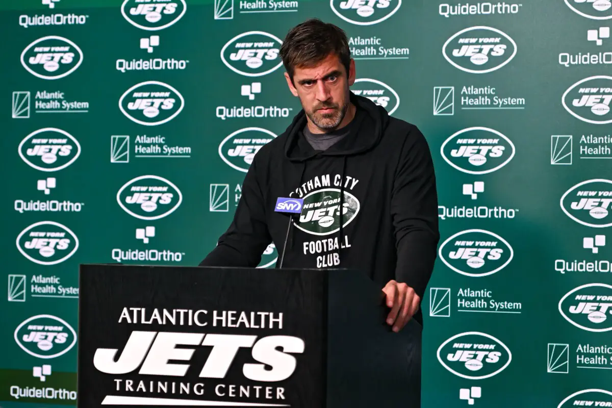 May 23, 2023; Florham Park, NJ, USA; New York Jets quarterback Aaron Rodgers (8) speaks at a press conference after practice at Atlantic Health Jets Training Center. Mandatory Credit: John Jones-USA TODAY Sports (NFL)