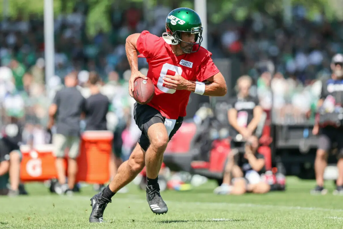 Jul 22, 2023; Florham Park, NJ, USA; New York Jets quarterback Aaron Rodgers (8) participates in drills during the New York Jets Training Camp at Atlantic Health Jets Training Center. Mandatory Credit: Vincent Carchietta-USA TODAY Sports (NFL)