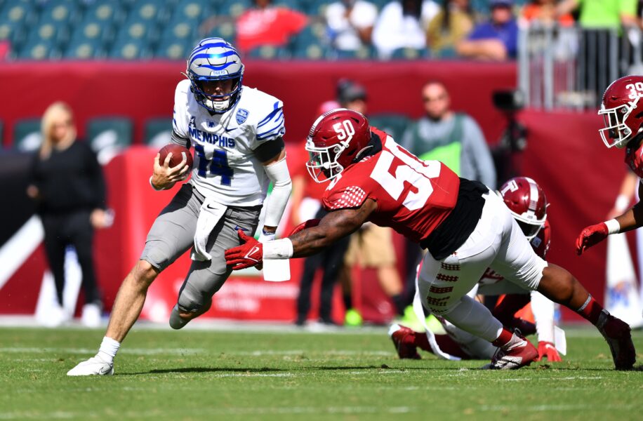Oct 2, 2021; Philadelphia, Pennsylvania, USA; Memphis Tigers quarterback Seth Henigan (14) carries the ball past Temple Owls defensive tackle Darian Varner (50) in the second half at Lincoln Financial Field. Mandatory Credit: Kyle Ross-USA TODAY Sports (Luke Fickell Wisconsin Badgers)