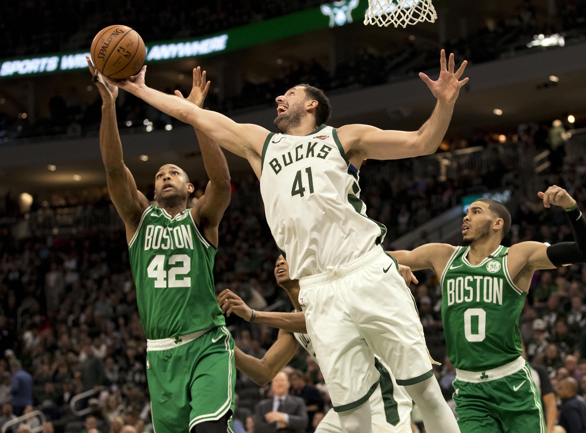 May 8, 2019; Milwaukee, WI, USA; Milwaukee Bucks forward Nikola Mirotic (41) reaches for a rebound over Boston Celtics center Al Horford (42) during the third quarter in game five of the second round of the 2019 NBA Playoffs at Fiserv Forum. Mandatory Credit: Jeff Hanisch-USA TODAY Sports (NBA News)
