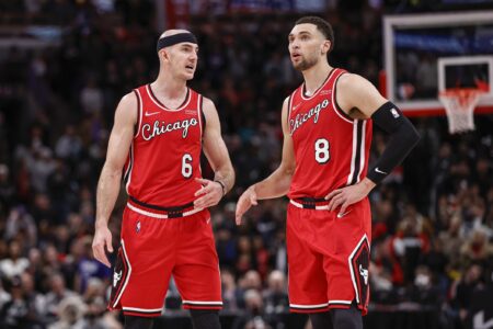 Mar 31, 2022; Chicago, Illinois, USA; Chicago Bulls guard Alex Caruso (6) talks with guard Zach LaVine (8) during overtime of an NBA game against the LA Clippers at United Center. Mandatory Credit: Kamil Krzaczynski-USA TODAY Sports (NBA Rumors)