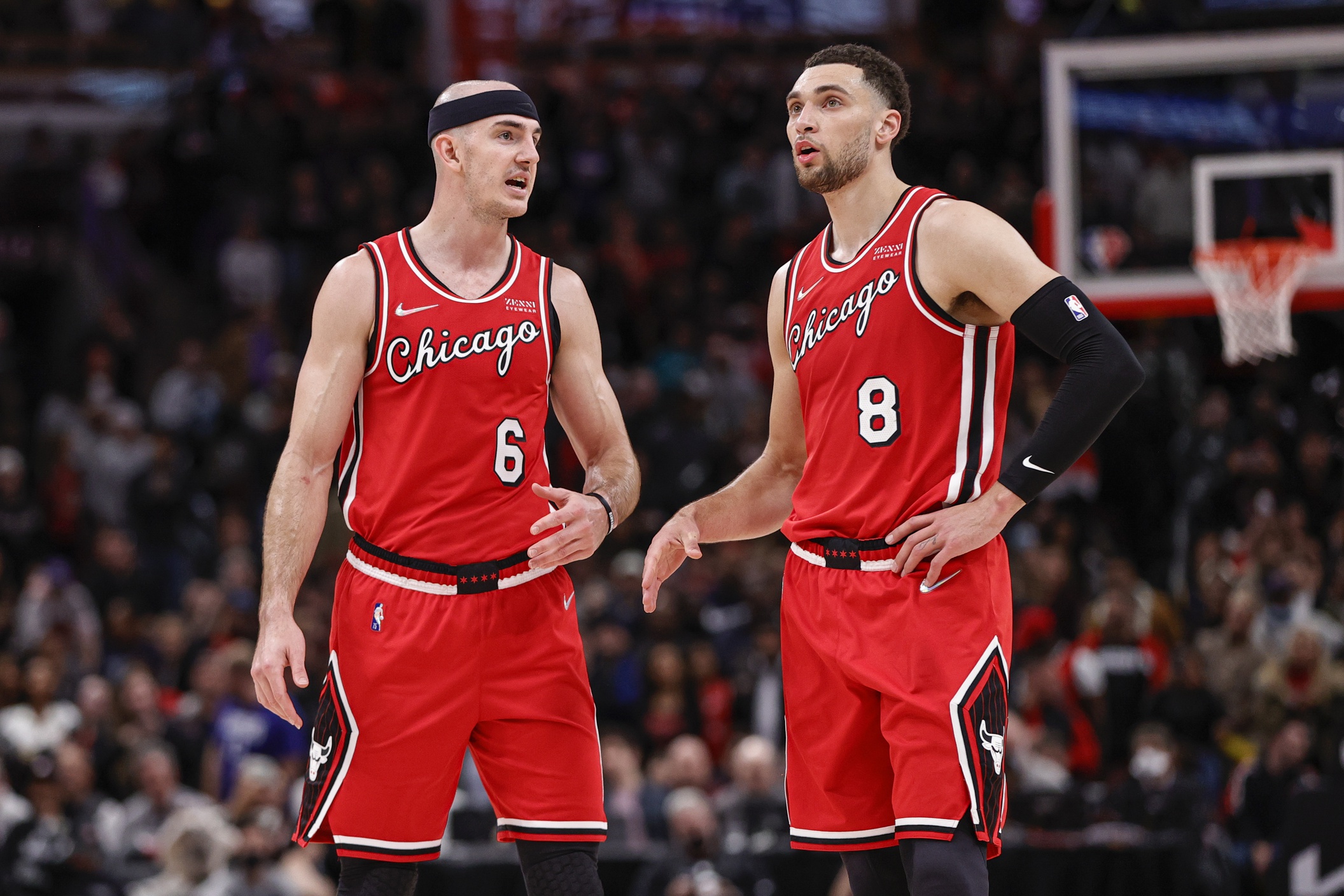 Mar 31, 2022; Chicago, Illinois, USA; Chicago Bulls guard Alex Caruso (6) talks with guard Zach LaVine (8) during overtime of an NBA game against the LA Clippers at United Center. Mandatory Credit: Kamil Krzaczynski-USA TODAY Sports (NBA Rumors)