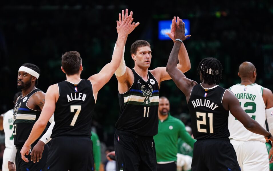 May 11, 2022; Boston, Massachusetts, USA; Milwaukee Bucks center Brook Lopez (11) guard Grayson Allen (7) and guard Jrue Holiday (21) react after a play against the Boston Celtics in the second half during game five of the second round for the 2022 NBA playoffs at TD Garden. Mandatory Credit: David Butler II-USA TODAY Sports NBA Rumors