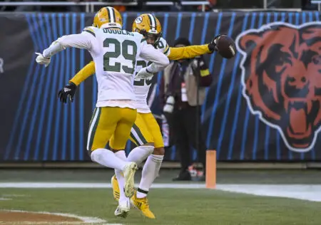 Dec 4, 2022; Chicago, Illinois, USA; Green Bay Packers cornerback Rasul Douglas (29) celebrates with cornerback Jaire Alexander (23) after Alexander made an interception against the Chicago Bears during the second half at Soldier Field. Mandatory Credit: Matt Marton-USA TODAY Sports