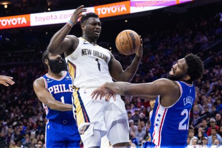 Jan 2, 2023; Philadelphia, Pennsylvania, USA; New Orleans Pelicans forward Zion Williamson (1) collides with Philadelphia 76ers center Joel Embiid (21) while driving for a shot during the third quarter at Wells Fargo Center. Mandatory Credit: Bill Streicher-USA TODAY Sports