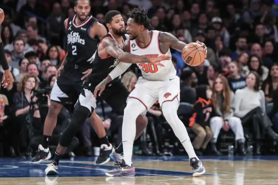 Feb 4, 2023; New York, New York, USA; New York Knicks forward Julius Randle (30) looks to post up against LA Clippers guard Paul George (13) in the fourth quarter at Madison Square Garden. Mandatory Credit: Wendell Cruz-USA TODAY Sports