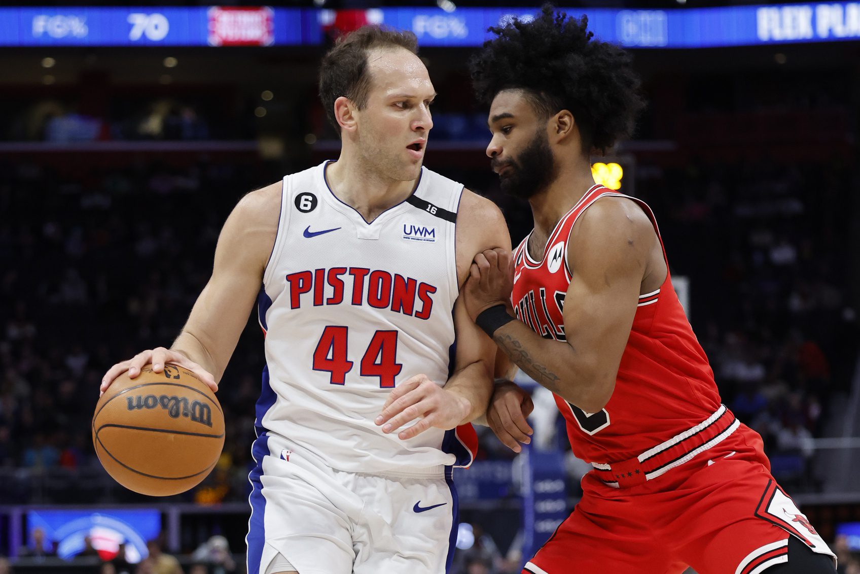 Mar 1, 2023; Detroit, Michigan, USA; Detroit Pistons forward Bojan Bogdanovic (44) dribbles defended by Chicago Bulls guard Coby White (0) in the first half at Little Caesars Arena. Mandatory Credit: Rick Osentoski-USA TODAY Sports