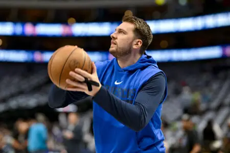 Apr 7, 2023; Dallas, Texas, USA; Dallas Mavericks guard Luka Doncic (77) warms up before the game against the Chicago Bulls at the American Airlines Center. Mandatory Credit: Jerome Miron-USA TODAY Sports