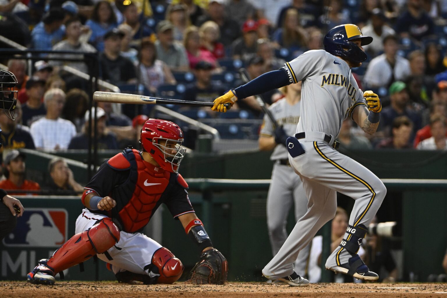 Milwaukee Brewers second baseman Brice Turang hits a two-out, two RBI single
