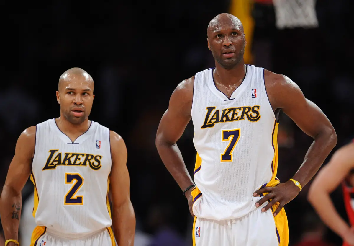 March 20, 2011; Los Angeles, CA, USA;Los Angeles Lakers point guard Derek Fisher (2) and power forward Lamar Odom (7) stand on the court against the Portland Trail Blazers in the fourth quarter at the Staples Center. Lakers won 84-80. Mandatory Credit: Jayne Kamin-Oncea-USA TODAY Sports NBA News