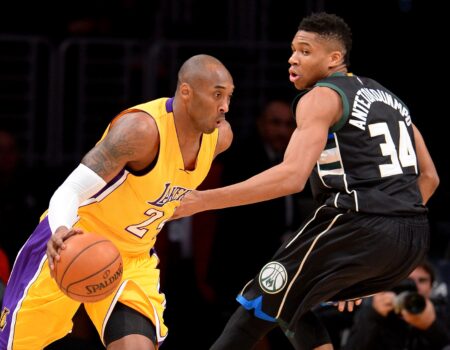 Dec 15, 2015; Los Angeles, CA, USA; Milwaukee Bucks forward Giannis Antetokounmpo (34) defends Los Angeles Lakers forward Kobe Bryant (24) as he drives to the basket in the first quarter of the game at Staples Center. Mandatory Credit: Jayne Kamin-Oncea-USA TODAY Sports