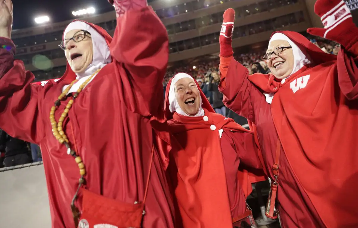 Wisconsin Badgers fans jump around at Camp Randall