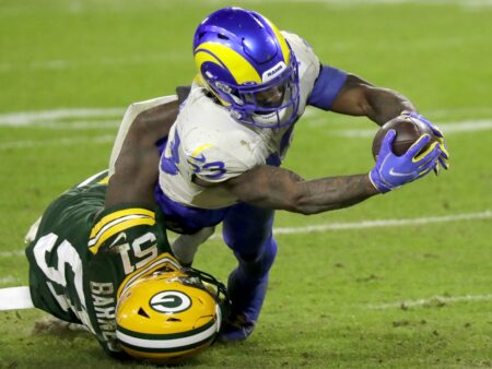 Los Angeles Rams running back Cam Akers (23) dives across the goal line against Green Bay Packers inside linebacker Krys Barnes (51) during their divisional playoff game on Saturday, January 16, 2021, at Lambeau Field in Green Bay, Wis. Apc Pack Vs Rams Div Playoff 2427 011621 Wag. © William Glasheen via Imagn Content Services, LLC Minnesota Vikings