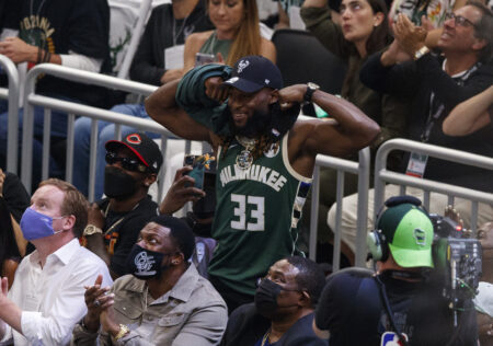 Jul 20, 2021; Milwaukee, Wisconsin, USA; Green Bay Packers running back Aaron Jones poses for the camera during the second quarter during game six of the 2021 NBA Finals between the Phoenix Suns and Milwaukee Bucks at Fiserv Forum. Mandatory Credit: Jeff Hanisch-USA TODAY Sports