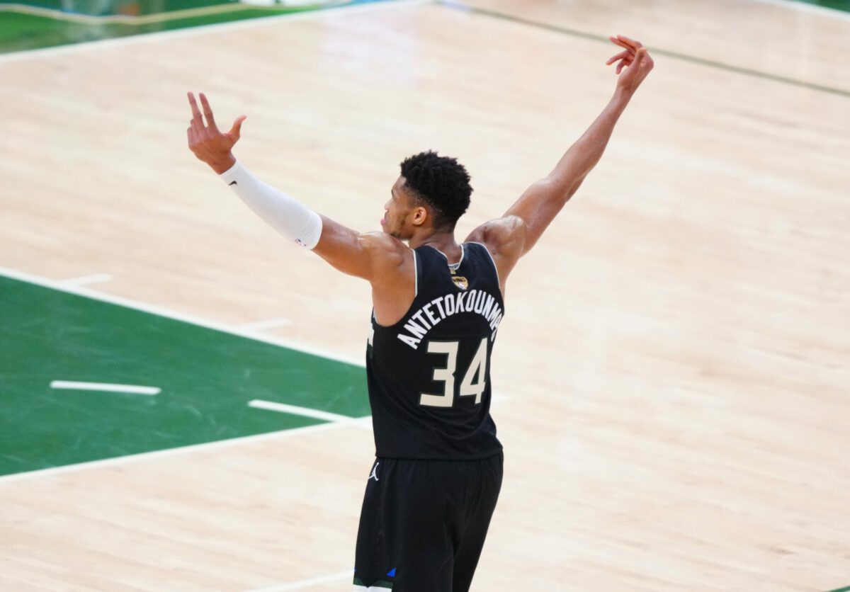 Jul 20, 2021; Milwaukee, Wisconsin, USA; Milwaukee Bucks forward Giannis Antetokounmpo (34) celebrates during game six of the 2021 NBA Finals against the Phoenix Suns at Fiserv Forum. Mandatory Credit: Mark J. Rebilas-USA TODAY Sports