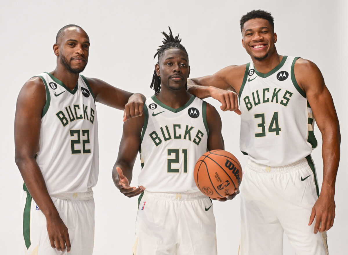 Sep 25, 2022; Milwaukee, WI, USA; Milwaukee Bucks forward Khris Middleton (22), guard Jrue Holiday (21) and forward Giannis Antetokounmpo (34) pose for a picture during media day at the Fiserv Forum.Mandatory Credit: Benny Sieu-USA TODAY Sports