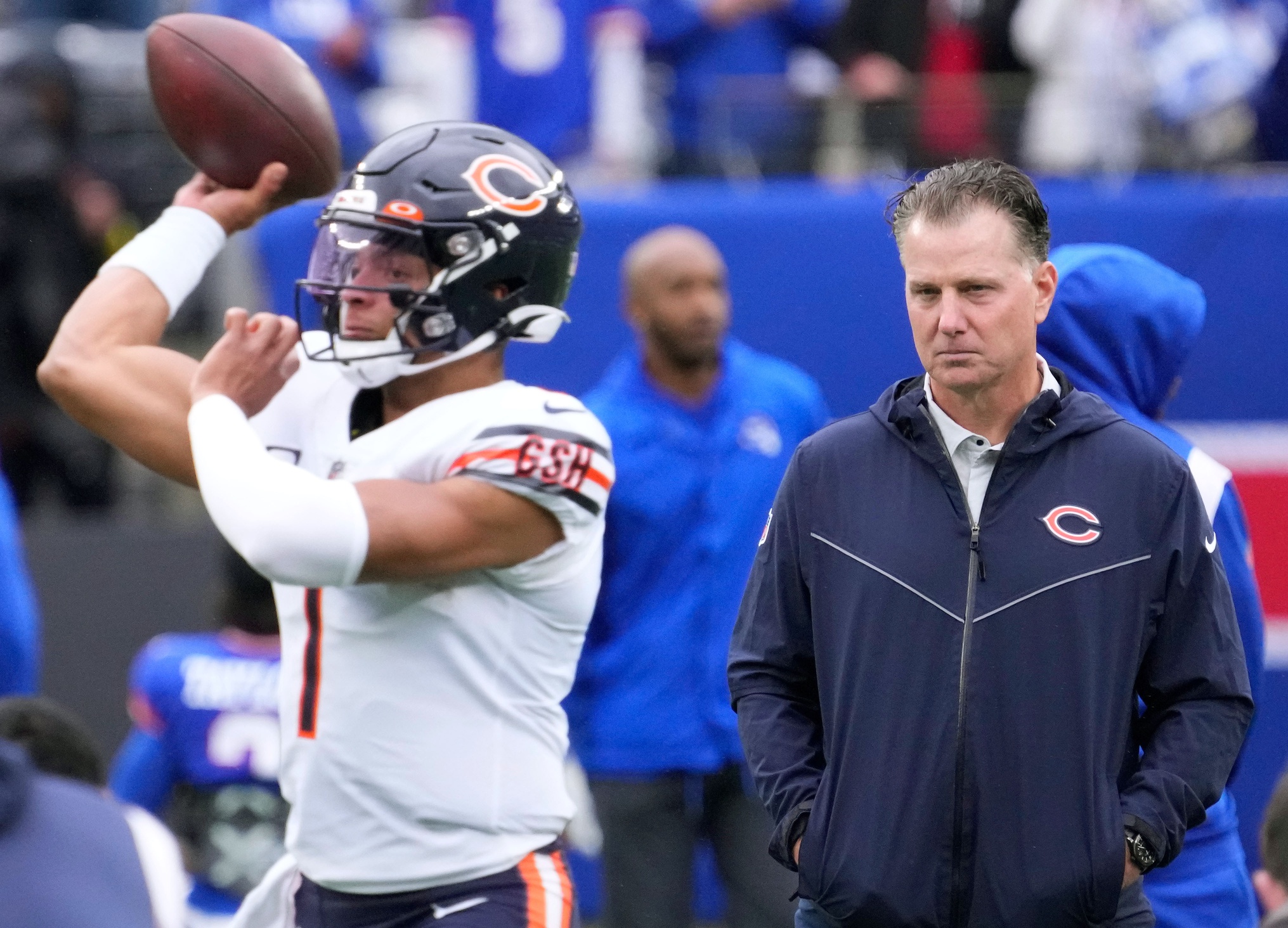 Oct 2, 2022; East Rutherford, New Jersey, USA; Chicago Bears head coach Matt Eberflus watches quarterback Justin Fields (1) warm up before the game against the New York Giants at MetLife Stadium. Mandatory Credit: Robert Deutsch-USA TODAY Sports