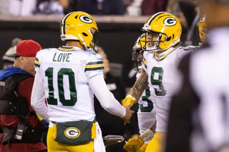 Nov 27, 2022; Philadelphia, Pennsylvania, USA; Green Bay Packers quarterback Jordan Love (10) and wide receiver Christian Watson (9) celebrate a touchdown connection against the Philadelphia Eagles during the fourth quarter at Lincoln Financial Field. Mandatory Credit: Bill Streicher-USA TODAY Sports
