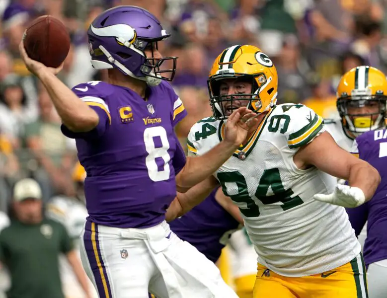 Green Bay Packers defensive end Dean Lowry (94) pressures Minnesota Vikings quarterback Kirk Cousins (8) during the first quarter of their game Sunday, September 11, 2022 at U.S. Bank Stadium in Minneapolis, Minn. Mjs Packers11 31 Jpg Packers11 114211850Green Bay Packers defensive end Dean Lowry (94) pressures Minnesota Vikings quarterback Kirk Cousins (8) during the first quarter of their game Sunday, September 11, 2022 at U.S. Bank Stadium in Minneapolis, Minn. Mjs Packers11 31 Jpg Packers11 114211850