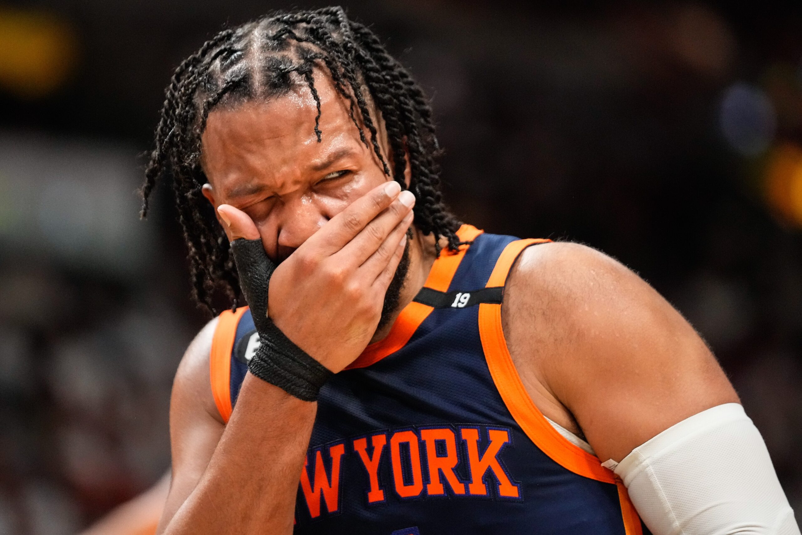 May 6, 2023; Miami, Florida, USA; New York Knicks guard Jalen Brunson (11) reacts to being struck ing the face by Miami Heat guard Gabe Vincent (2) during the second half of game three of the 2023 NBA playoffs at Kaseya Center. Mandatory Credit: Rich Storry-USA TODAY Sports