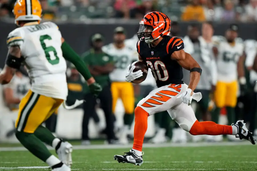 Cincinnati Bengals running back Chase Brown (30) carries the ball in the third quarter during a Week 1 NFL preseason game between the Green Bay Packers and the Cincinnati Bengals, Friday, Aug. 11, 2023, at Paycor Stadium in Cincinnati. © Kareem Elgazzar/The Enquirer / USA TODAY NETWORK