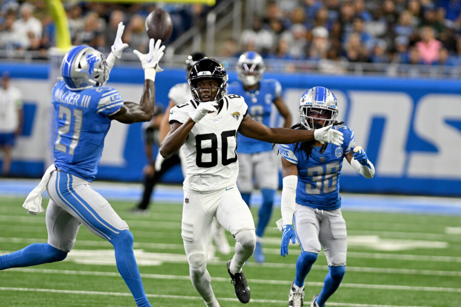 Aug 19, 2023; Detroit, Michigan, USA; Detroit Lions safety Tracy Walker III (21) attempts to intercept a pass intended for Jacksonville Jaguars wide receiver Kevin Austin Jr. (80) in the second quarter at Ford Field. Mandatory Credit: Lon Horwedel-USA TODAY Sports