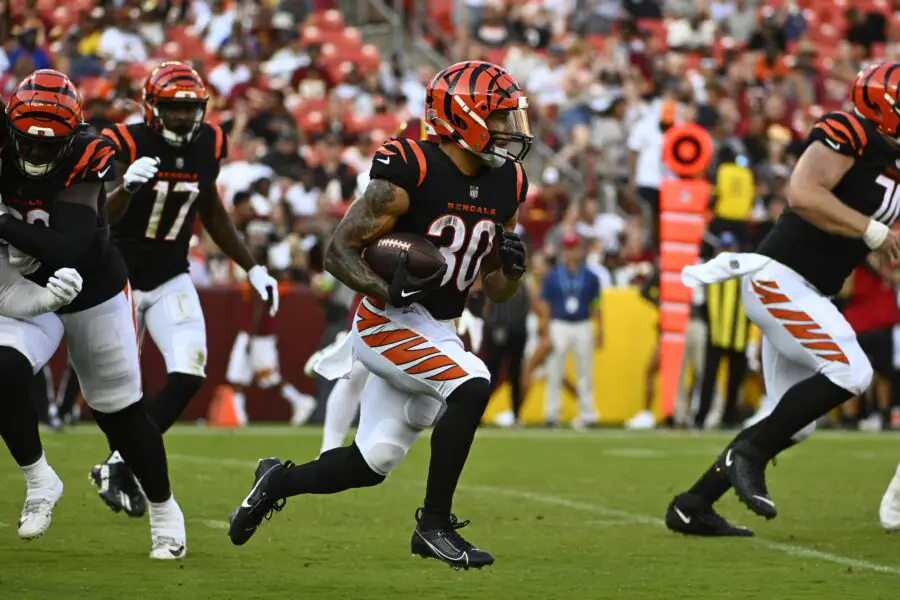 Aug 26, 2023; Landover, Maryland, USA; Cincinnati Bengals running back Chase Brown (30) carries the ball against the Washington Commanders during the first half at FedExField. Mandatory Credit: Brad Mills-USA TODAY Sports (Green Bay Packers)