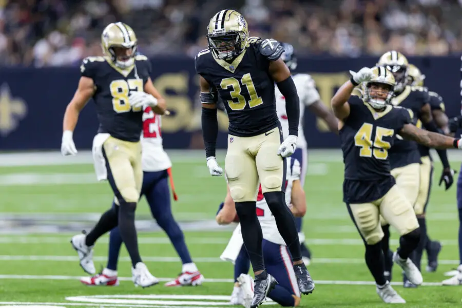 Aug 27, 2023; New Orleans, Louisiana, USA; New Orleans Saints safety Jordan Howden (31) reacts to making a tackle on Houston Texans wide receiver Adam Humphries (27) during the second half at the Caesars Superdome. Mandatory Credit: Stephen Lew-USA TODAY Sports