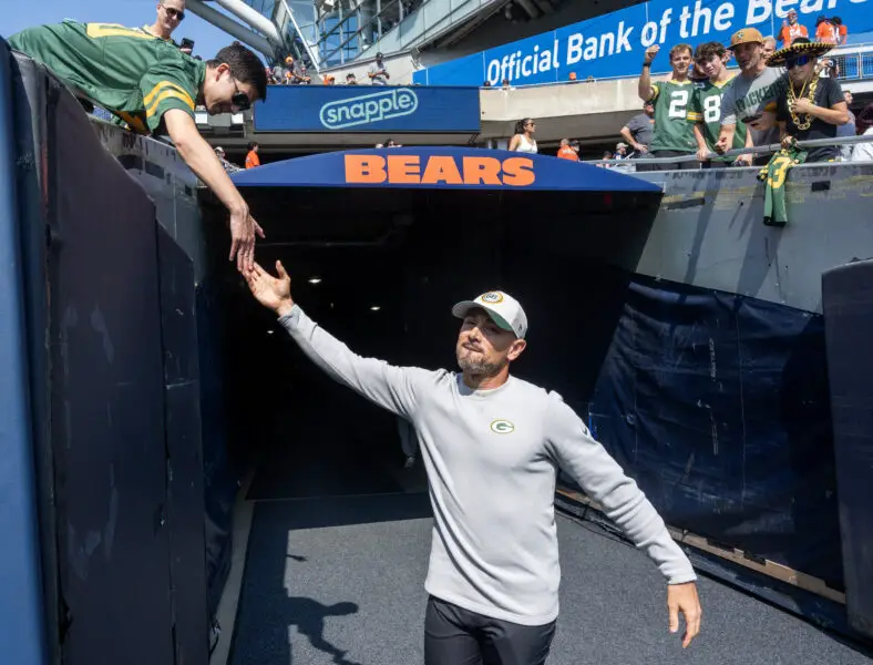 Sep 10, 2023; Chicago, Illinois, USA; Green Bay Packers head coach Matt LaFleur greets a fan before their game against the Chicago Bears at Soldier Field. Mandatory Credit: Mark Hoffman-USA TODAY Sports