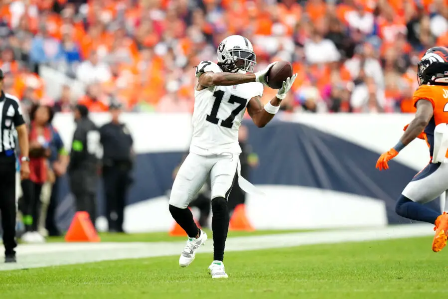 Sep 10, 2023; Denver, Colorado, USA; Las Vegas Raiders wide receiver Davante Adams (17) catches the ball in the fourth quarter against the Denver Broncos at Empower Field at Mile High. Mandatory Credit: Ron Chenoy-USA TODAY Sports (Green Bay Packers)
