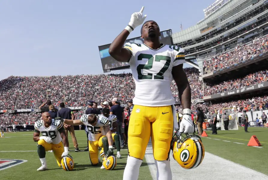 Sep 10, 2023; Chicago, Illinois, USA; Green Bay Packers running back Patrick Taylor (27) takes a moment before the start of the football game against the Chicago Bears at Soldier Field. Mandatory Credit: Dan Powers-USA TODAY Sports