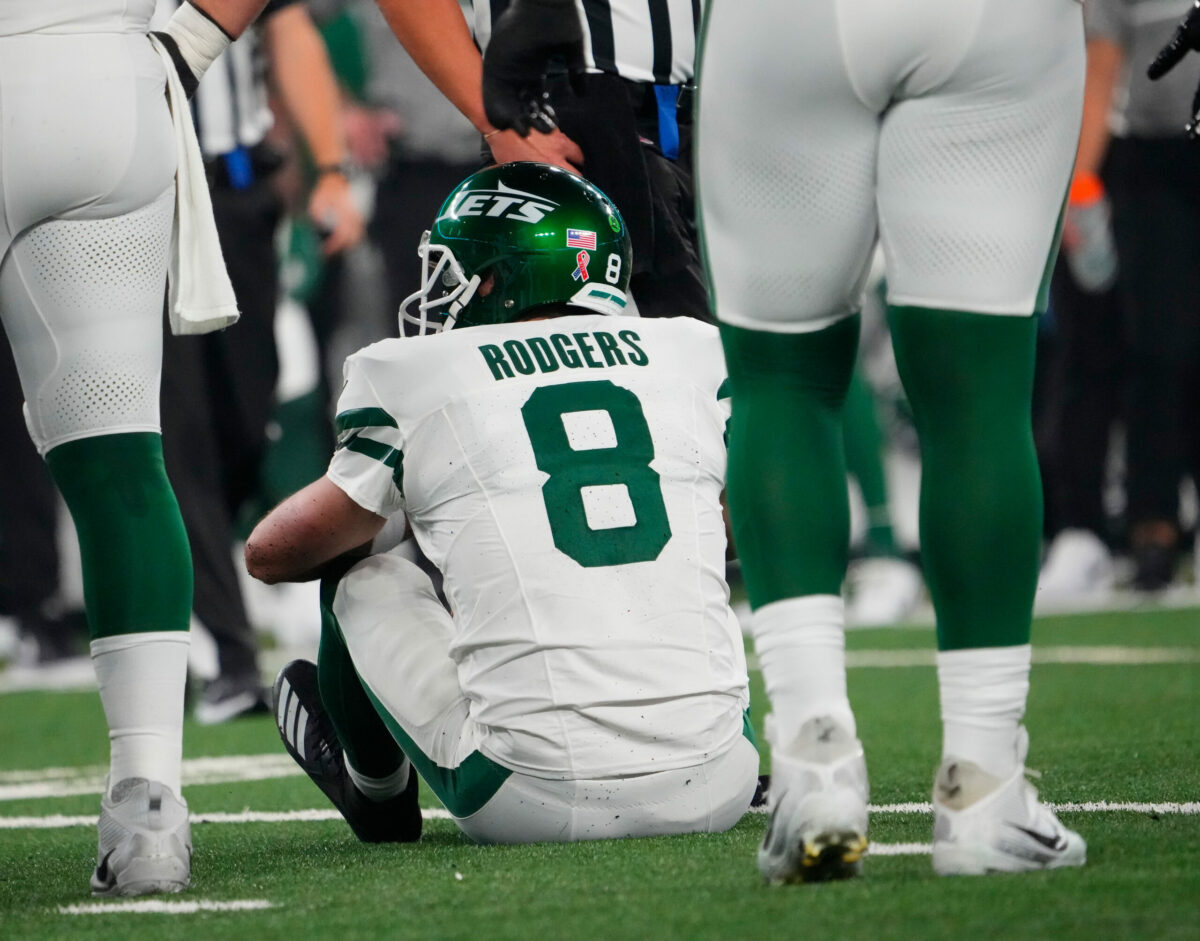 Sep 11, 2023; East Rutherford, New Jersey, USA; New York Jets quarterback Aaron Rodgers (8) sits on the field after a sack by Buffalo Bills defensive end Leonard Floyd (not pictured) at MetLife Stadium. Rodgers left the game with an injury after the play. Mandatory Credit: Robert Deutsch-USA TODAY Sports