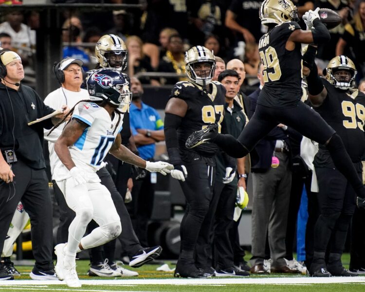 New Orleans Saints cornerback Paulson Adebo (29) intercepts a pass intended for Tennessee Titans wide receiver DeAndre Hopkins (10) during the third quarter at the Caesars Superdome in New Orleans, La., Sunday, Sept. 10, 2023. © Andrew Nelles / Tennessean.com / USA TODAY NETWORK