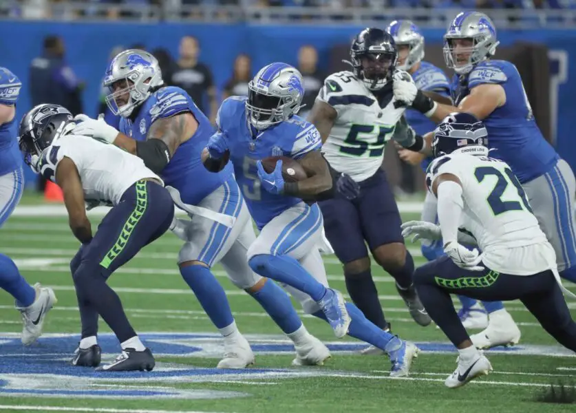 Detroit Lions running back David Montgomery (5) runs the ball against the Seattle Seahawks during first half action Sunday, Sept.17 2023.