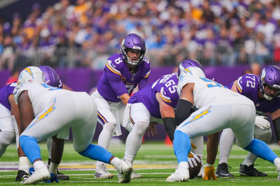 Sep 24, 2023; Minneapolis, Minnesota, USA; Minnesota Vikings quarterback Kirk Cousins (8) under center against the Los Angeles Chargers in the first quarter at U.S. Bank Stadium. Mandatory Credit: Brad Rempel-USA TODAY Sports (Green Bay Packers)