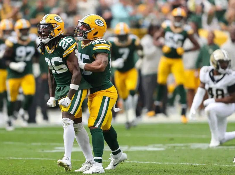 Green Bay Packers safety Darnell Savage (26) and linebacker Eric Wilson (45) celebrate after Savage makes a tackle on a kickoff against the New Orleans Saints on Sunday, September 24, 2023, at Lambeau Field in Green Bay, Wis. The Packers came back from a 17-0 fourth-quarter deficit to win the game, 18-17. Tork Mason/USA TODAY NETWORK-Wisconsin