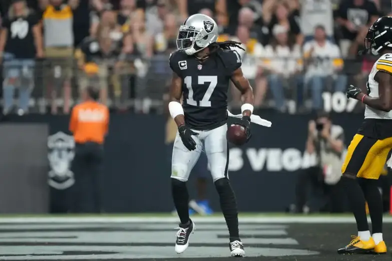 Sep 24, 2023; Paradise, Nevada, USA; Las Vegas Raiders wide receiver Davante Adams (17) reacts after catching a touchdown pass against the Pittsburgh Steelers in the first half at Allegiant Stadium. Mandatory Credit: Kirby Lee-USA TODAY Sports (Green Bay Packers)