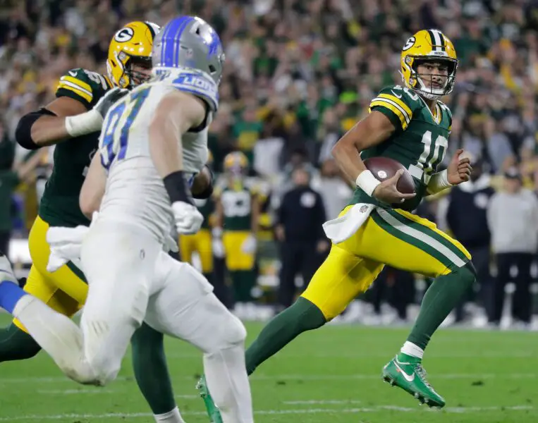 Green Bay Packers quarterback Jordan Love (10) rushes for a fourth quarter touchdown against the Detroit Lions t during their football game Thursday, September 28, 2023, at Lambeau Field in Green Bay, Wis.The lions defeated the Packers 34-20.Wm. Glasheen USA TODAY NETWORK-Wisconsin
